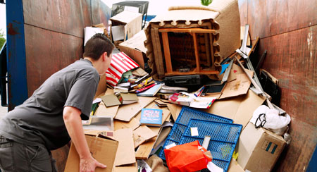 Loading junk removal truck